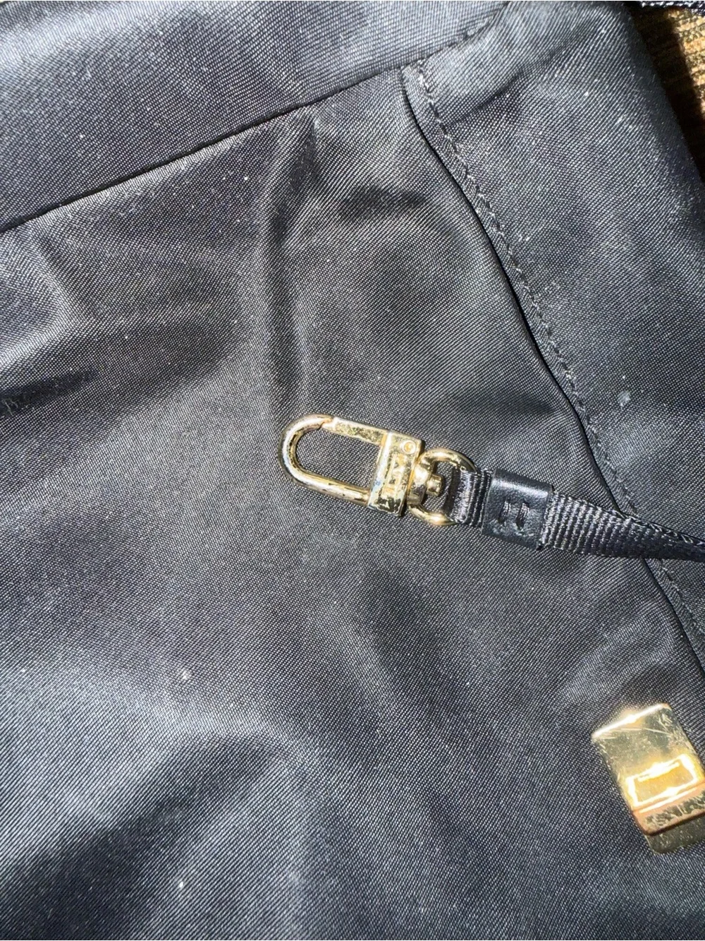 Tumi Black Sling Belt Bag with Gold Hardware